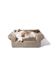 ragdoll-cat-relaxing-on-kamamuta-bread-sofa-bed-mid-shot-on-white-background