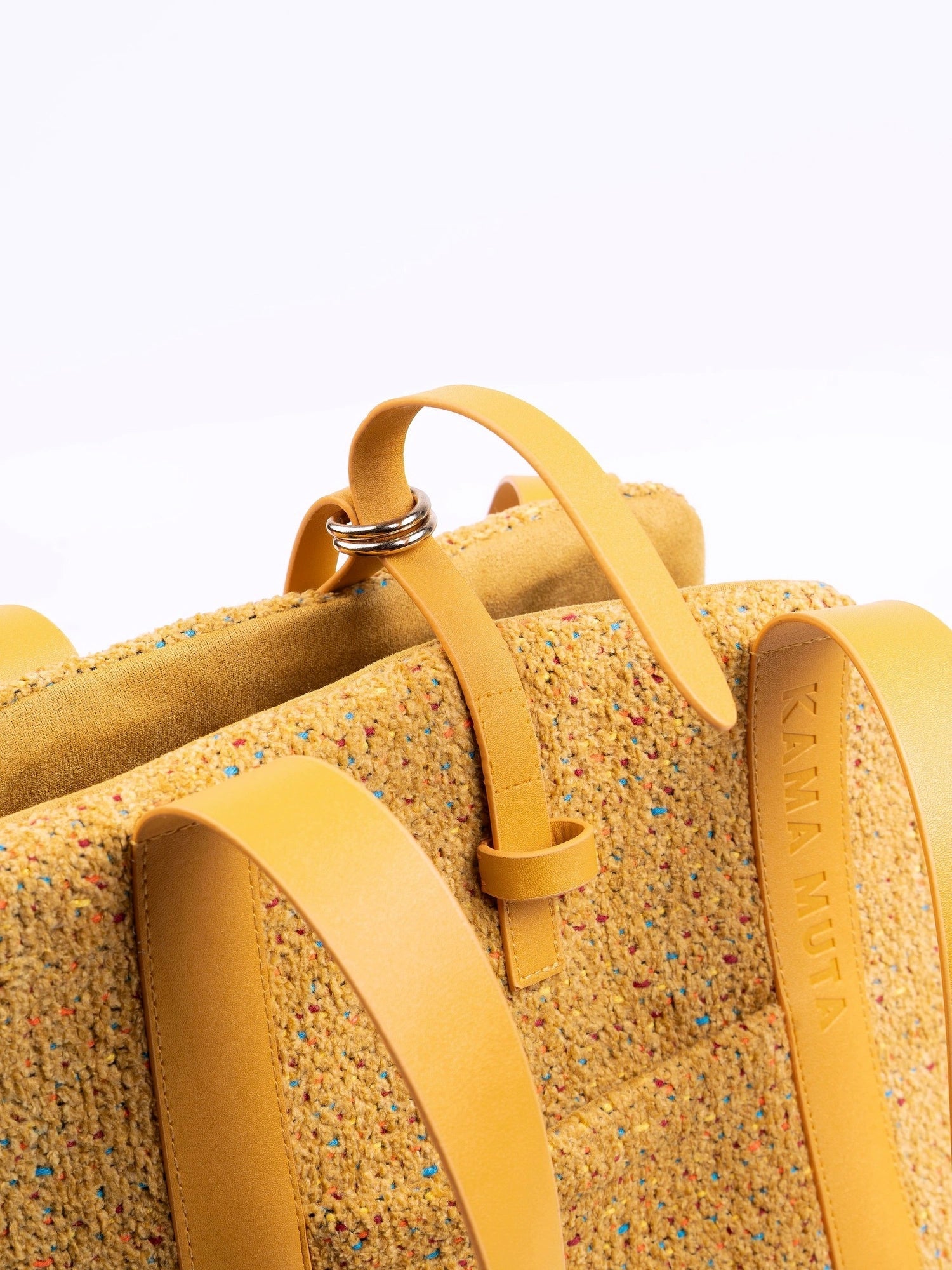close-up-of-yellow-kamamuta-mini-tweed-tote-bag-leather-and-metal-hardware-details close-up-of-yellow-kamamuta-mini-tweed-tote-bag-leather-and-metal-hardware-details