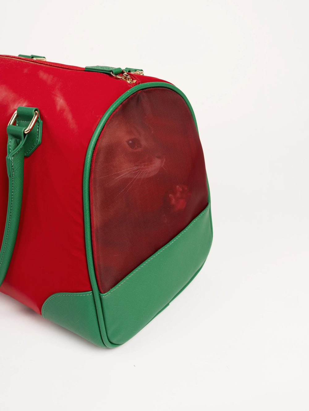 kamamuta-red-boston-pet-bag-side-on-floor-cat-visible-through-breathable-mesh-window