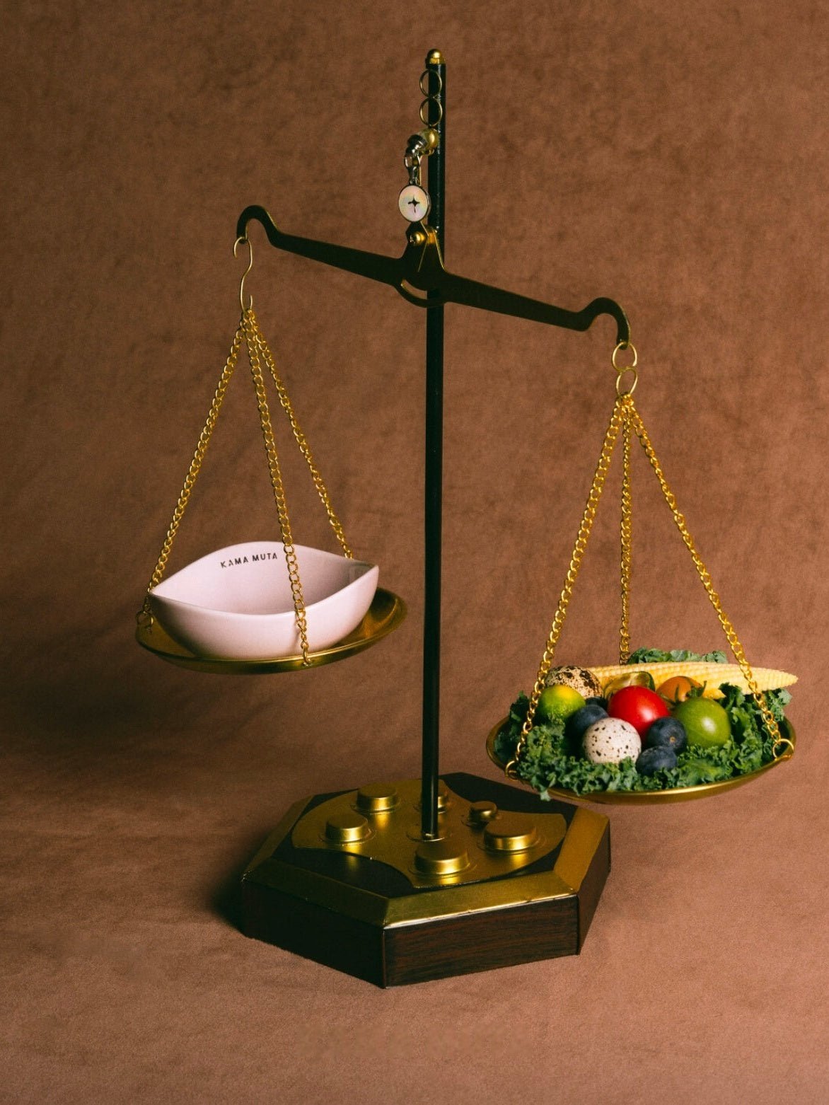 vintage-brown-balance-scale-with-pink-kamamuta-pet-pod-bowl-on-one-side-and-fruits-vegetables-on-other-side vintage-brown-balance-scale-with-pink-kamamuta-pet-pod-bowl-on-one-side-and-fruits-vegetables-on-other-side