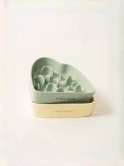 two-different-color-kamamuta-mountain-slow-feeder-bowls-stacked-together